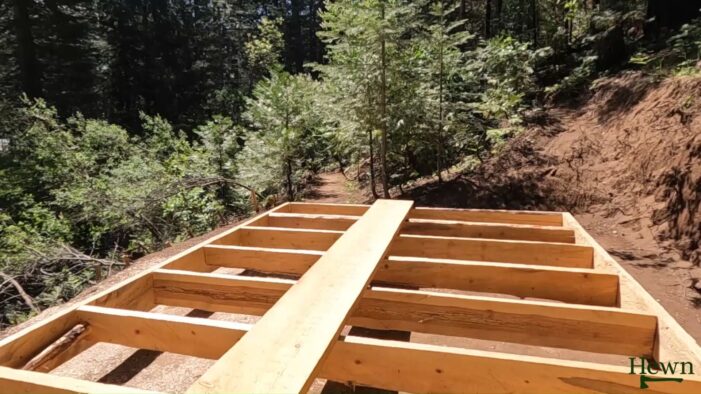 Hand Chainsaw Milled Flooring Install Continues…Chainsaw Cabin Day 22